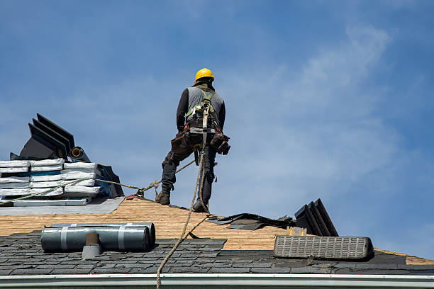 Professional Roofing technician working in Norwood, MA